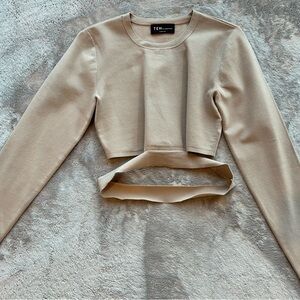 Cream Crop Top with Crew Neck Long Sleeves and Cut Out Style Features